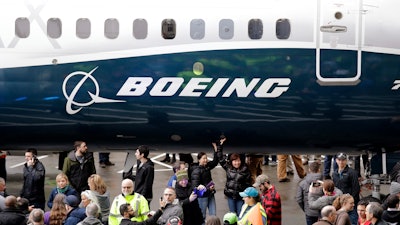 In this Feb. 5, 2018, file photo a Boeing 737 MAX 7 is displayed during a debut for employees and media of the new jet in Renton, Wash.
