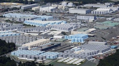 This aerial view shows the tanks containing treated radioactive wastewater at the Fukushima Daiichi nuclear power plant in Fukushima, northern Japan, on Aug. 22, 2023.