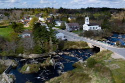 The Pleasant River flows through Columbia Falls, Maine, April 27, 2023.