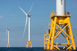 Three wind turbines stand in the water off Block Island, R.I, the nation's first offshore wind farm, Aug. 15, 2016.