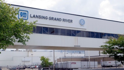 A vehicle enters General Motor’s Lansing Grand River Assembly plant, Tuesday, Sept. 12, 2023, in Lansing, Mich., just days before auto workers could potentially strike due failed contract negotiations.
