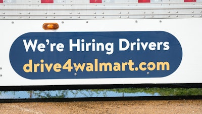 An ad for drivers is displayed on a Walmart truck in Richland, Miss., Wednesday, Sept. 6, 2023. On Thursday, the Labor Department reports on the number of people who applied for unemployment benefits last week.