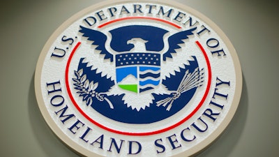 The Department of Homeland Security logo is seen during a news conference in Washington, Feb. 25, 2015.