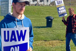 Logan Bohn, a member of the striking United Auto Workers, stands outside the Stellantis plant that makes Jeeps in Toledo, Ohio, on Friday, September 15, 2023. Bohn is a temporary worker at the plant.