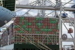 In this photo provided by the Georgia Ports Authority, a vessel is loaded with containers by a ship to shore crane at the Georgia Ports Authority's Port of Savannah Garden City Terminal, on Oct. 21, 2021, in Savannah, Ga.