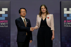 Britain's Michelle Donelan, Secretary of State for Science, Innovation and Technology, right, and Wu Zhaohui, Chinese Vice Minister of Science and Technology, shake hands prior to the AI Saftey Summit in Bletchley Park, Milton Keynes, England, Wednesday, Nov. 1, 2023.
