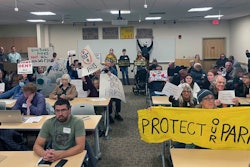 Protesters against fracking in state parks gathered for an Oil and Gas Land Management Commission meeting in Columbus, Ohio on Wednesday, Nov. 15, 2023. The commission voted to frack several state park and wildlife areas for oil and gas in a tense public meeting, much to the disappointment of Ohio environmental advocates.
