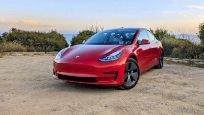 This photo provided by Edmunds shows the Tesla Model 3. The Long Range version boasts more than 300 miles of range as well as all-wheel drive.