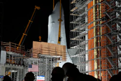 Space Shuttle Endeavour is lifted into the site of the future Samuel Oschin Air and Space Center on Monday, Jan. 29, 2024, in Los Angeles.
