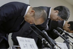 Akihiro Kobayashi, President of Kobayashi Pharmaceutical Co., left, bows during a press conference in Osaka, on March 22, 2024. Health supplement products believed to have caused a few deaths and sickened more than a hundred people have been ordered taken off store shelves in Japan. The products from Kobayashi Pharmaceutical, billed as helping lower cholesterol, contained an ingredient called “benikoji,” a red species of mold.