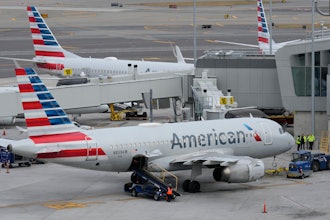 American Airlines planes sit on the tarmac at Terminal B at LaGuardia Airport, Jan. 11, 2023, in New York.