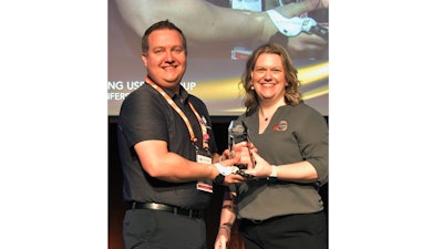 (Left) Chris Baschuk of Point Designs LLC, with Bonnie Meyer, accepting the award for his first-place finish in the Advanced Concepts category of AMUG’s 2024 Technical Competition.