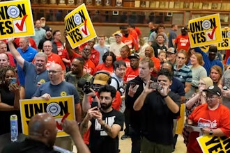 Volkswagen workers celebrate in Chattanooga, Tenn., after their bid to join the UAW union prevailed.