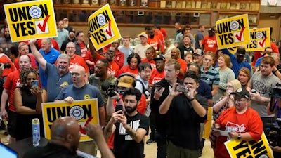 Volkswagen workers celebrate in Chattanooga, Tenn., after their bid to join the UAW union prevailed.