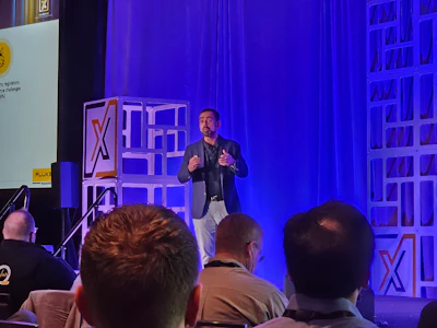 Fluke Reliability President Ankush Malhotra speaks at Xcelerate 2024 in Orlando.