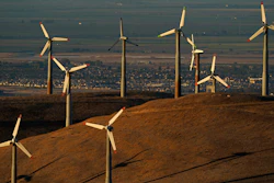 Wind turbines work in Livermore, Calif., Aug. 10, 2022.