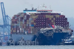 Crews work to move the cargo ship Dali in Baltimore, Monday, May 20, 2024.