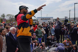 Chris Smalls, president of the Amazon Labor Union, speaks at a rally outside an Amazon warehouse on Staten Island in New York, April 24, 2022.