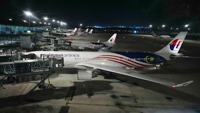 A Malaysia airlines plane parked at Kuala Lumpur International Airport in Sepang, Malaysia.