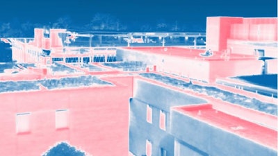 A thermal image of buildings walls and roofs.