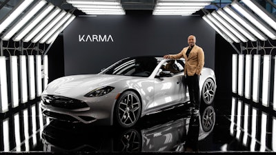Marques McCammon, President, Karma Automotive with the 3rd Generation Karma Revero.