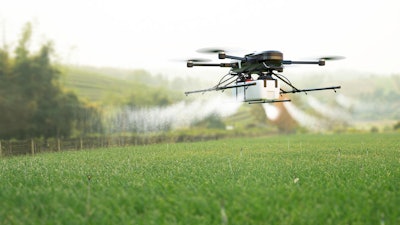 Drone spraying Herbicide.