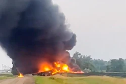 This photo provided by Doug Zink, smoke fills the sky after a train derailment on Friday, July 5, 2024 near Carrington, N.D.