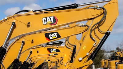 Caterpillar excavator booms at the Milton CAT dealership, Londonderry, N.H., Feb. 20, 2020.