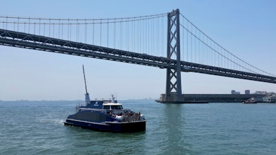 The MV Sea Change, the first commercial passenger ferry powered by hydrogen fuel cells, is seen on the water.