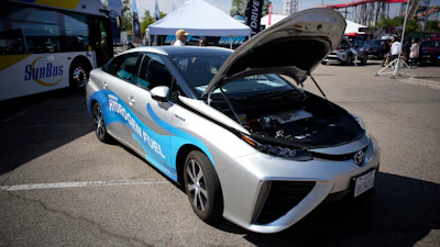 A 2021 Toyota Prius that runs on a hydrogen fuel cell sits on display at the Denver auto show.