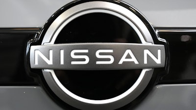 A Nissan logo is displayed on a Nissan Pathfinder SUV at the Pittsburgh International Auto Show in Pittsburgh.