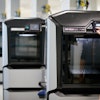 A worker receives advanced training on a Stratasys fused deposition modeling (FDM) 3D printer.