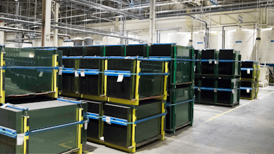 Stacks of glass panes are shown during a grand opening tour of the Fuyao Glass America plant, Friday, Oct. 7, 2016, in Moraine, Ohio.