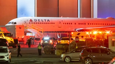 Multiple Atlanta Fire Rescue Department units and police park outside a Delta Maintenance facility near Hartsfield-Jackson International Airport early Tuesday, Aug. 27, 2024 in Atlanta.