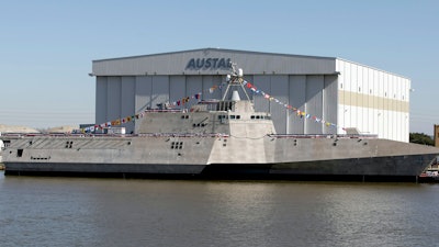 The Littoral Combat Ship Coronado sits alongside the Austal USA facilities on the Mobile River in Mobile, Ala., following christening ceremonies for the ship, Jan. 14, 2012.