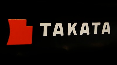 The logo of Takata Corp. is displayed at an auto supply shop in Tokyo.