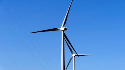 Land-based wind turbines spin in Atlantic City, N.J.