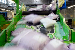 Parcels slide down a ramp after being scanned at the U.S. Customs and Border Protection overseas mail inspection facility at Chicago's O'Hare International Airport Feb. 23, 2024, in Chicago.