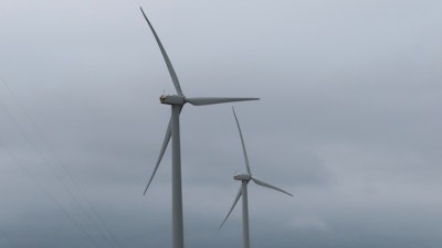 Land-based wind turbines spin in Atlantic City, N.J.