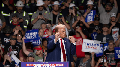 Republican presidential nominee former President Donald Trump dances after finishing his remarks at a campaign rally at Ed Fry Arena in Indiana, Pa., Monday, Sept. 23, 2024.