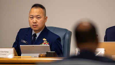 Gim Kang, special counsel for the Coast Guard's Titan Submersible Marine Board of Investigation, listens during the formal hearing inside the Charleston County Council Chambers, Monday, Sept. 23, 2024, in North Charleston, S.C.