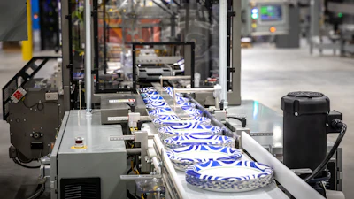 Dixie tableware comes off a production line at the new Georgia-Pacific facility in Jackson, Tennessee.