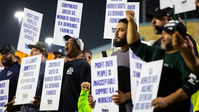 Longshoremen strike at midnight at Bayport Terminal on Tuesday, Oct. 1, 2024, in Houston.