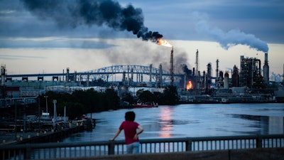Flames and smoke rise from the Philadelphia Energy Solutions Refining Complex in Philadelphia, June 21, 2019.