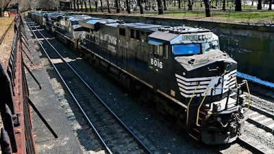 A Norfolk Southern freight train rolls in Pittsburgh, on March 26, 2018.