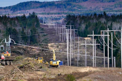 Heavy machinery is used to cut trees to widen an existing Central Maine Power power line corridor to make way for new utility poles, April 26, 2021, near Bingham, Maine.