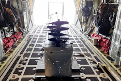 A Silent Arrow GD-2000 carrying a 1,000-pound payload is loaded aboard an MC-130J for deployment in the INDOPACOM AOR.