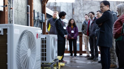 LG's Heat pumps displayed to an audience.