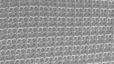 An image of the full lattice geometry is juxtaposed with an 18.75-million cell lattice.