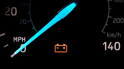 A car's battery light turned on.